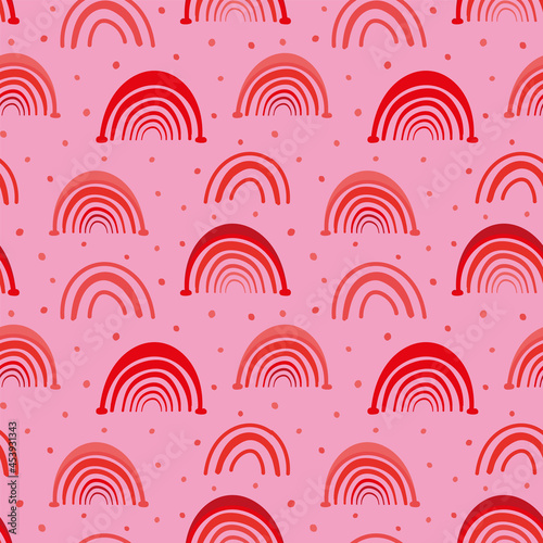 Red and Orange Rainbows on polka dots seamless pattern design. Girly design perfect for baby and kids fashion, fabric, accessories, wallpaper, scrapbooking, partyware