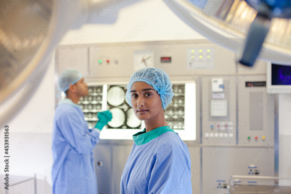 Surgeon standing in operating room Surgeon standing in operating room