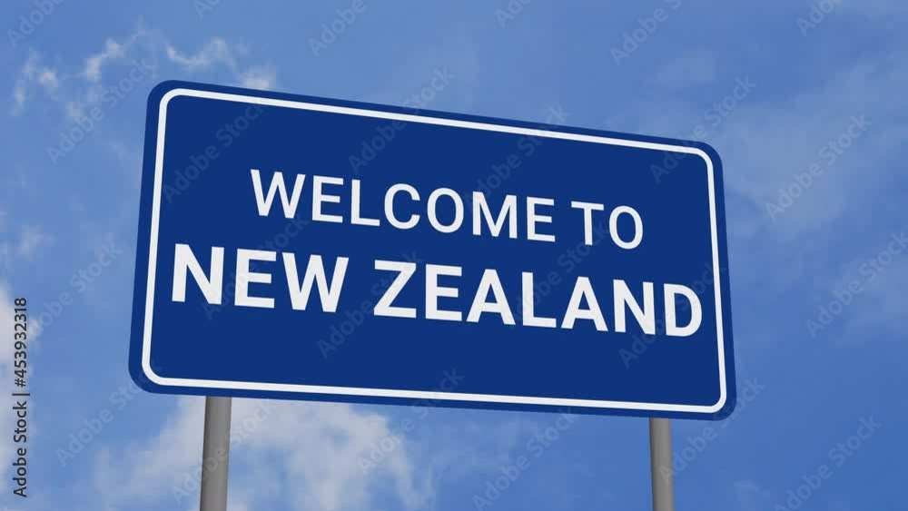 Welcome to New Zealand Road Sign on Clear Blue Sky with Rapid Moving Clouds Welcome to New Zealand Road Sign on Clear Blue Sky with Rapid Moving Clouds
