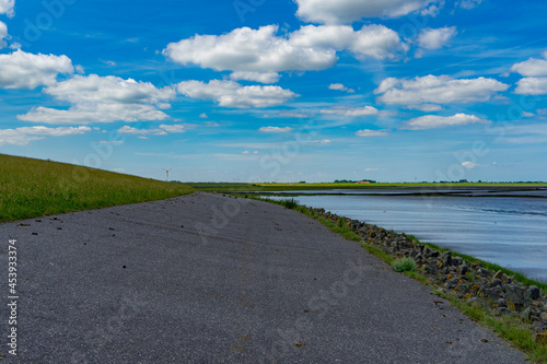 Lonely wadden sea stone road in dornum photo