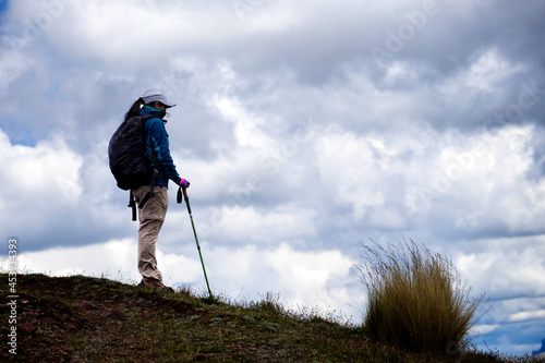 Woman doing trekking in the Andes