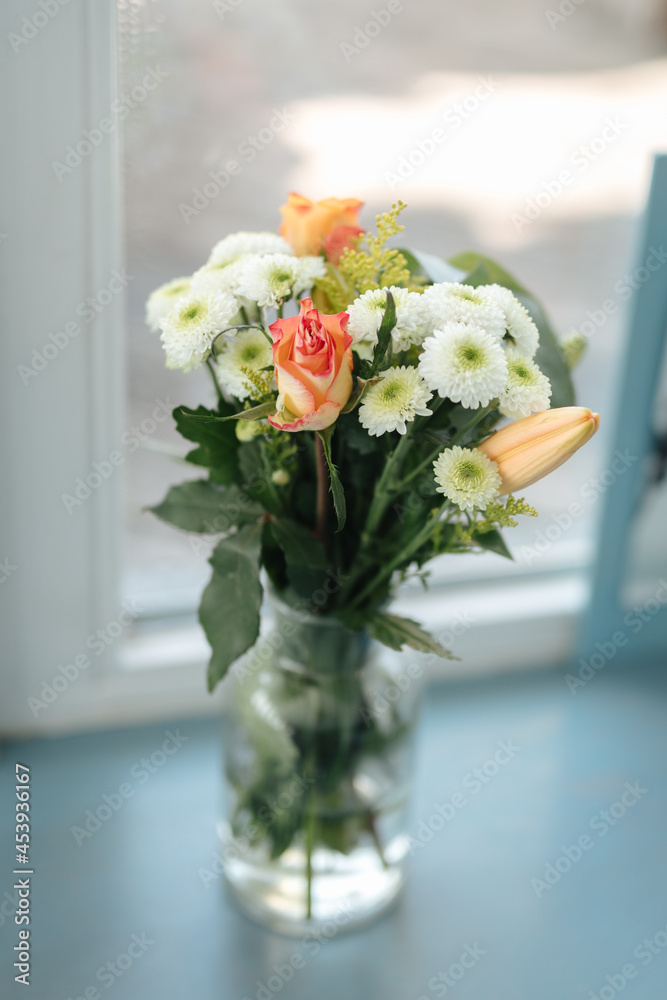 Beautiful flowers in front of a blue background Beautiful flowers in front of a blue background