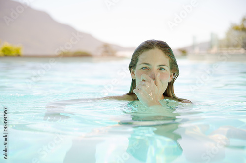 Close up of woman relaxing in swimming pool © KOTO