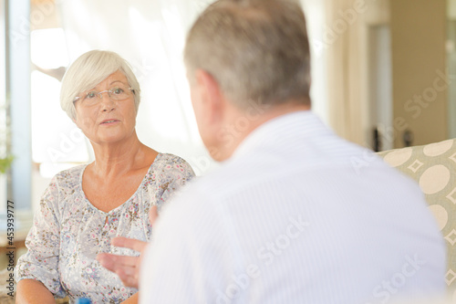 Older couple talking and smiling