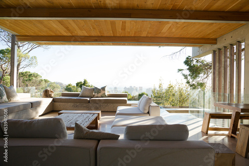 Sofas and coffee table on modern balcony © KOTO