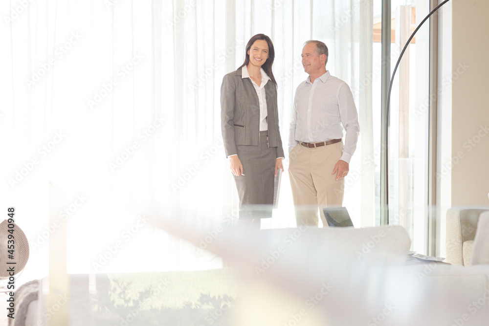 Financial advisor talking to client indoors