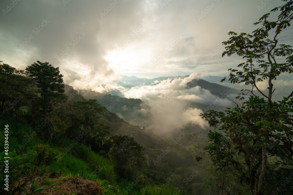 Cloudy horizontal landscape Colombian mountain range with clouds and mountains and sun Vía Nacional Letras Cloudy horizontal landscape Colombian mountain range with clouds and mountains and sun Vía Nacional Letras