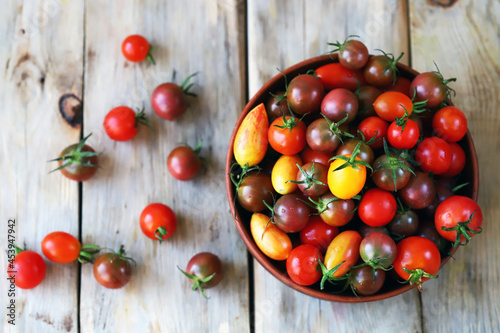 Colored mini tomatoes in a bowl.