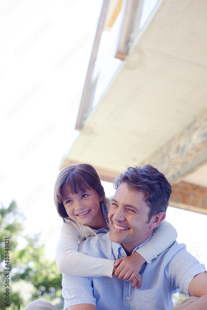 Fototapeta premium Father and daughter hugging outdoors