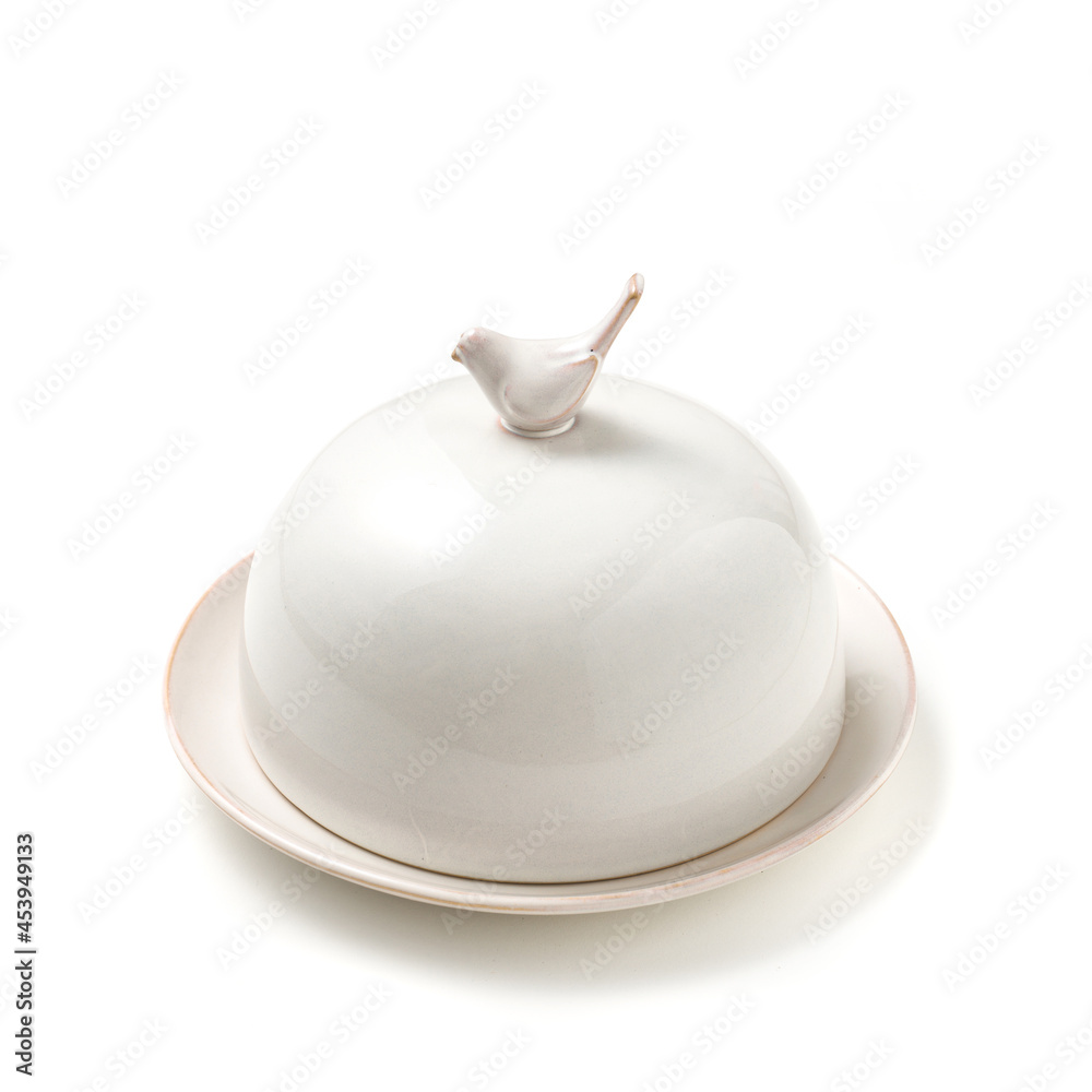 Cloche for food in ceramic. handle with decorative bird. isolated white background. with clipping path Cloche for food in ceramic. handle with decorative bird. isolated white background. with clipping path