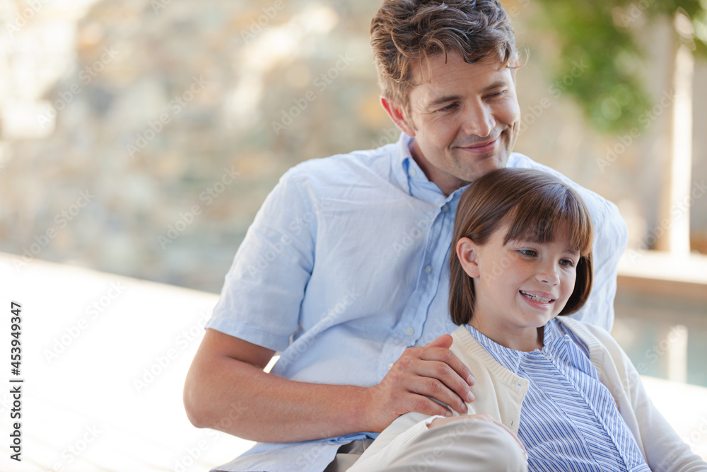 Obraz premium Father and daughter outdoors, smiling