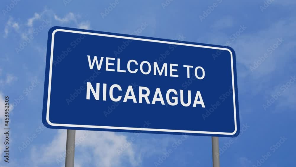 Welcome to Nicaragua Road Sign on Clear Blue Sky with Rapid Moving Clouds Welcome to Nicaragua Road Sign on Clear Blue Sky with Rapid Moving Clouds