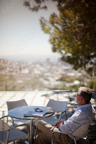 Older man relaxing outdoors