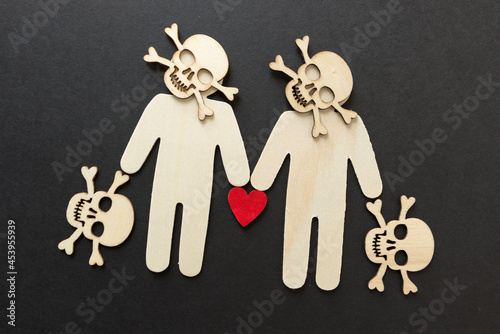 Obraz na plátne wooden silhouettes with laser cut-scary monster masks and skull and bones on a d