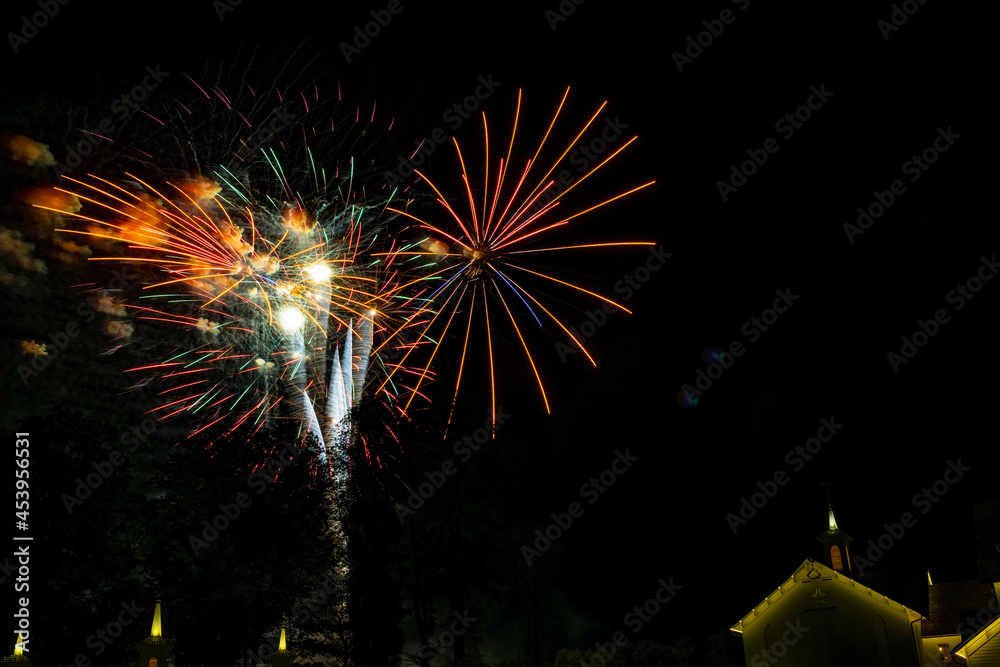 A Fireworks Display on a Beautiful Night Full of Color and multiple Explosions