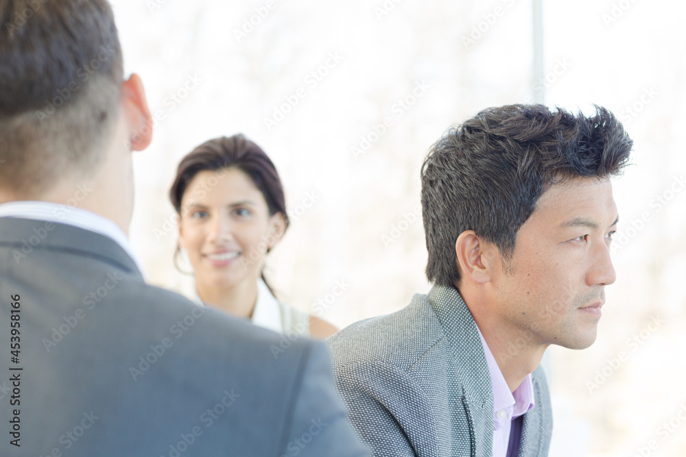 Fototapeta premium Businessmen smiling in office