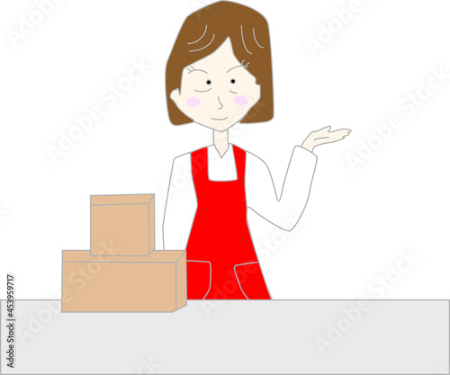 荷物を渡すエプロンをつけた女性