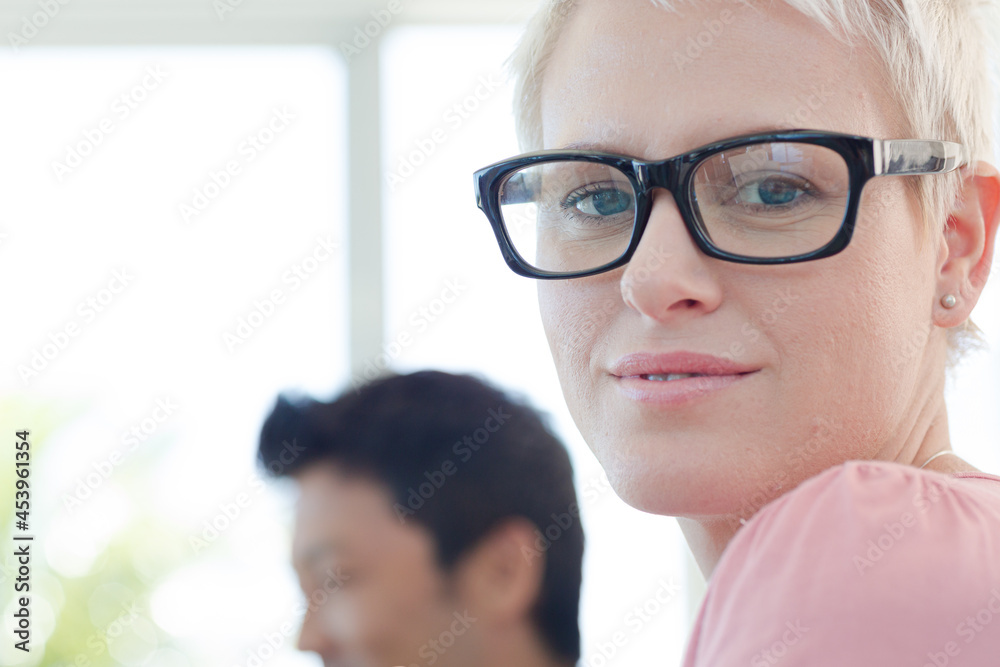 Businesswoman sitting in meeting Businesswoman sitting in meeting