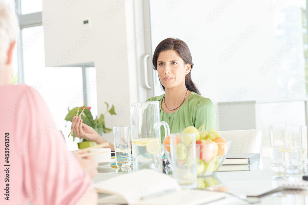 Businesswoman sitting in meeting