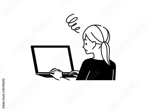 ノートパソコンを使っている女性-黒