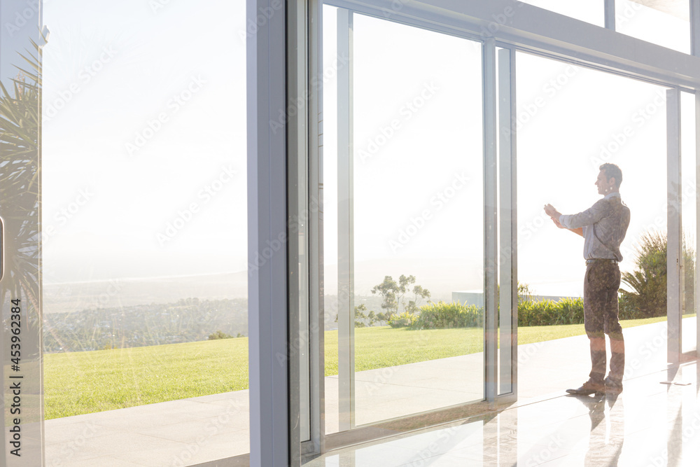 Businessman talking on cell phone outdoors Businessman talking on cell phone outdoors