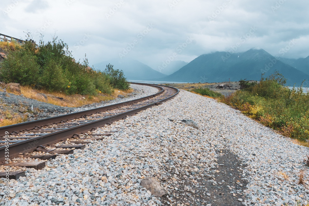 railroad with a beautiful mountains on background railroad with a beautiful mountains on background