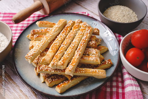 salty sesame bread sticks traditional homemade baked snacks on the table - top view close up healthy vegan or vegetarian food concept