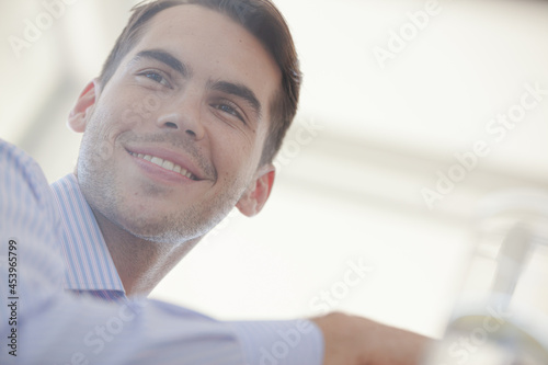 Businessman smiling in office