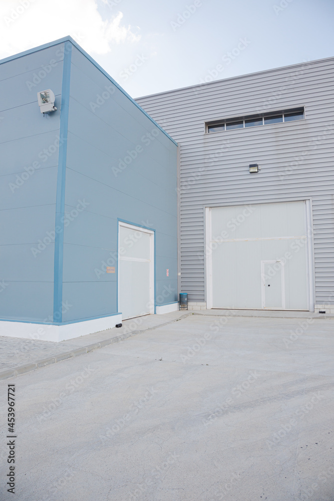 Building with garage door Building with garage door
