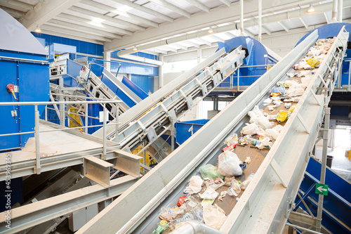 Recycled material on conveyor belt in recycling center