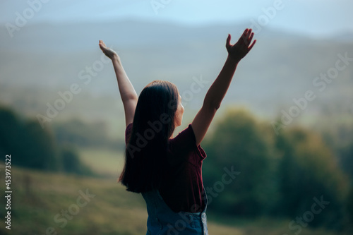 Excited Woman with Opened Arms Contemplating the View