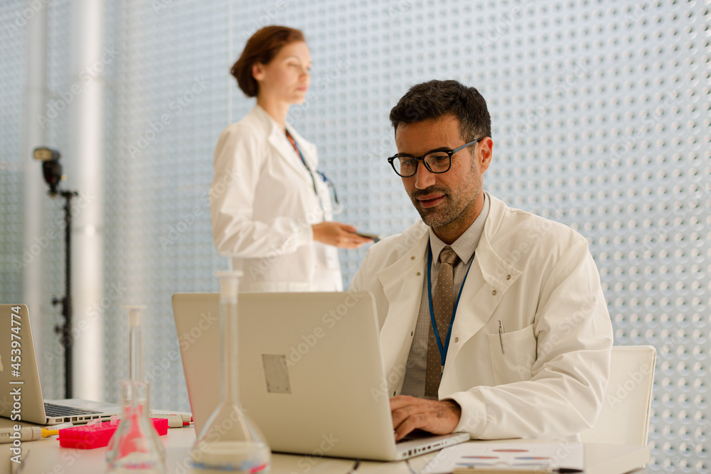 Fototapeta premium Doctor working at laptop