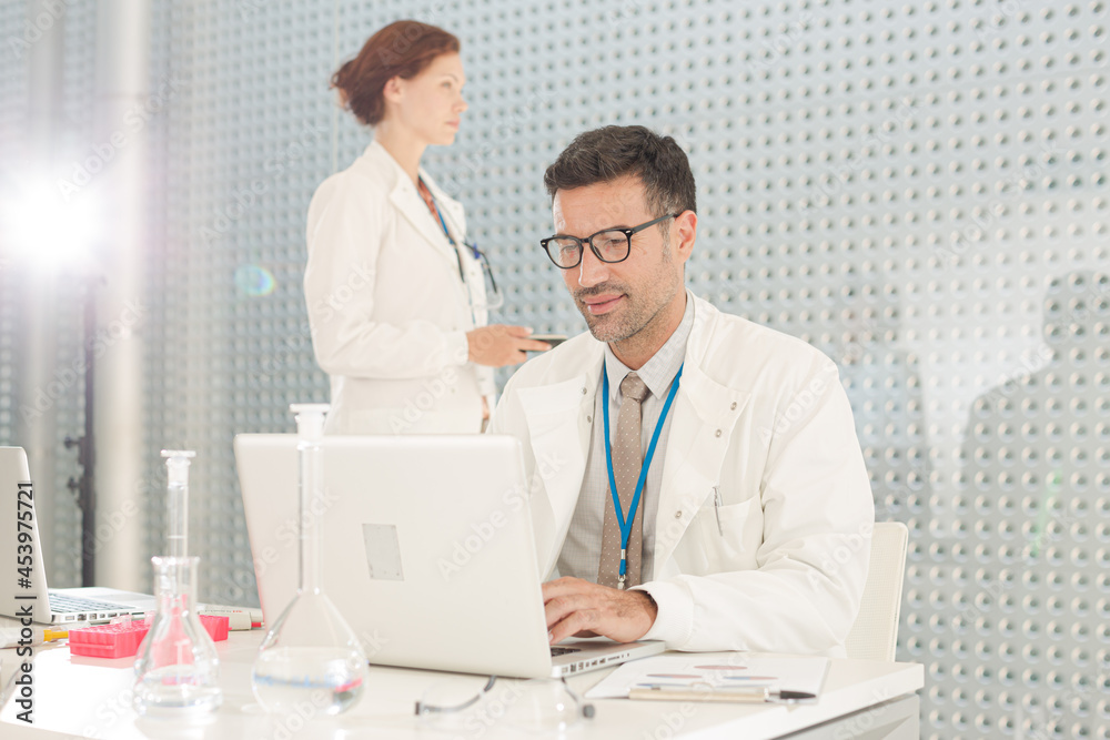 Doctor working at laptop Doctor working at laptop