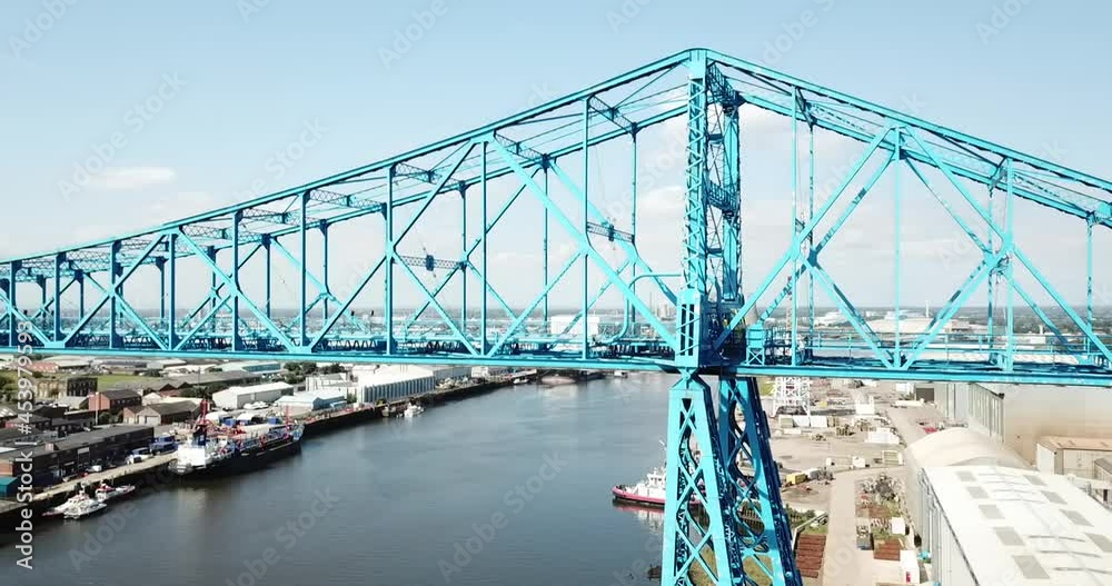 Middlesbrough Transporter Bridge. A pan from right to left across the River Tees
