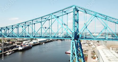 Middlesbrough Transporter Bridge. A pan from right to left across the River Tees photo