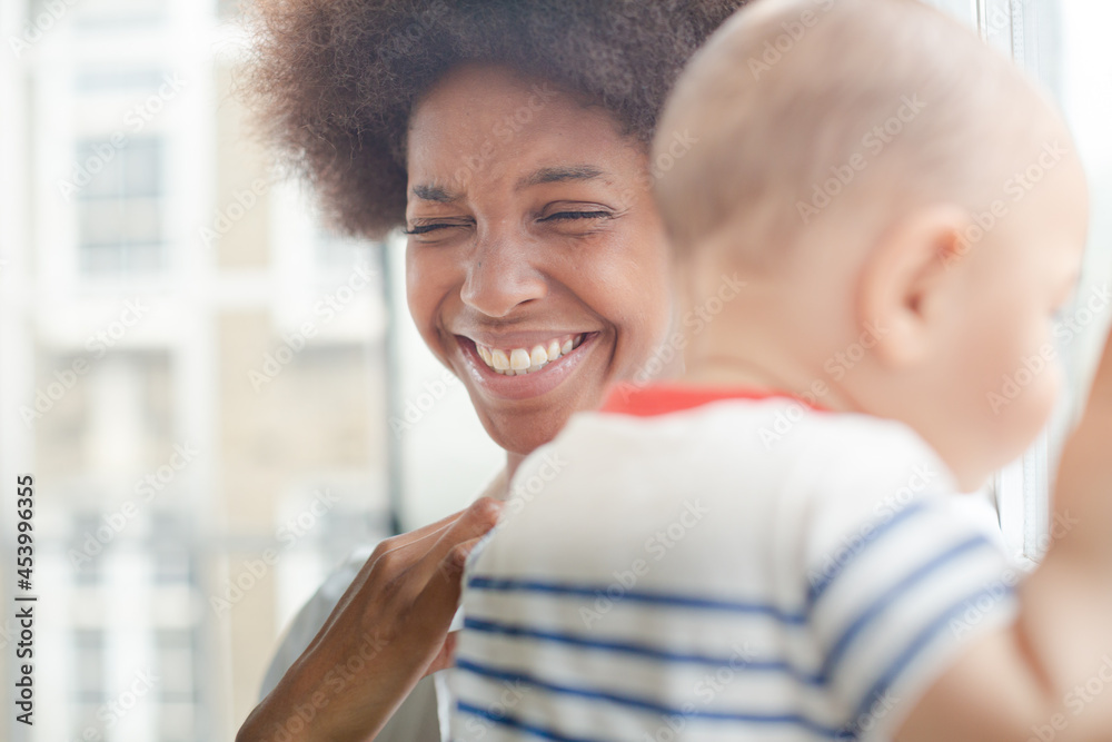 Mother holding baby boy