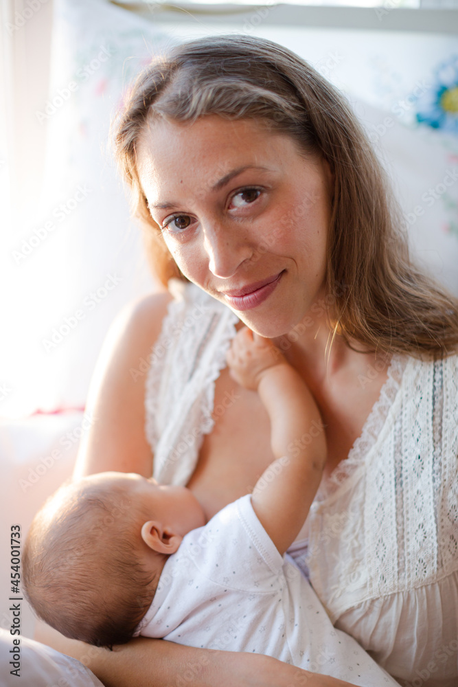 Mother breast-feeding baby boy Mother breast-feeding baby boy