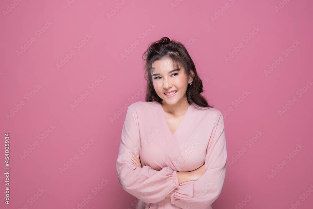 Portrait beautiful young woman in the studio on pink background, asian girl
Portrait beautiful young woman in the studio on pink background, asian girl