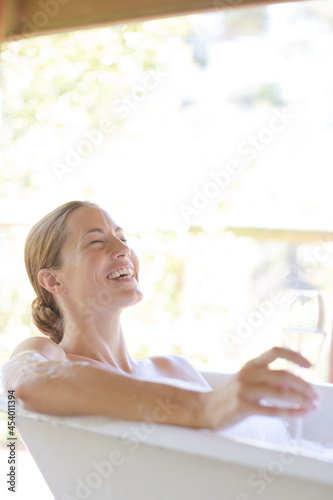 Woman having champagne in bubble bath Free Download Woman having champagne in bubble bath - GFXLoad