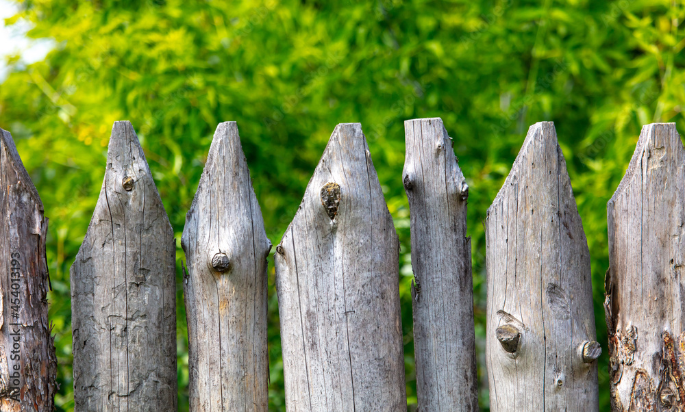 A fence made of wooden logs