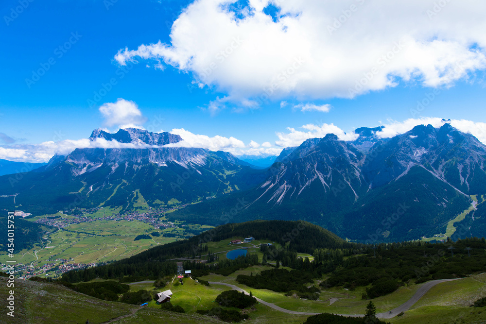 Panoramic view of the idyllic mountain backdrop. Popular holiday destination in the German Alps. Tourism and vacations concept. Bavaria, Germany