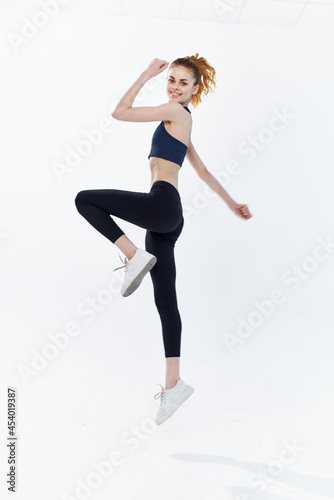 sportive woman jumping workout energy active lifestyle © SHOTPRIME STUDIO