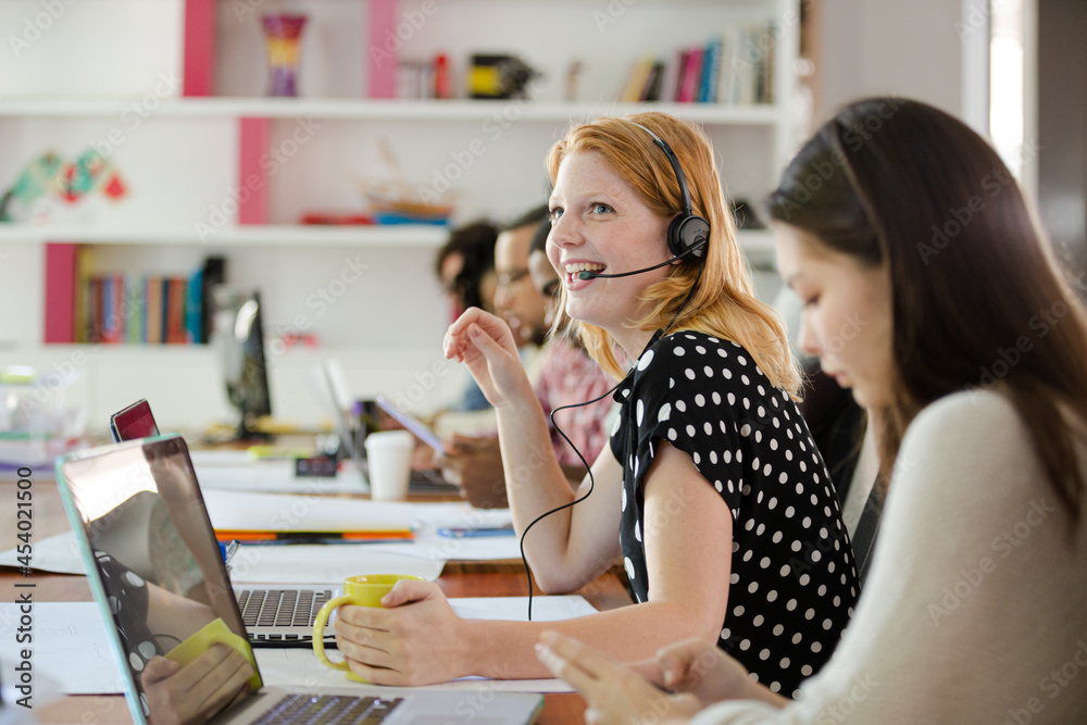 People working at conference table in office People working at conference table in office