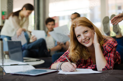 Woman writing in office