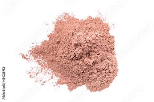 Dry red cosmetic clay isolated on white background. Heap of pink cosmetic clay. photo