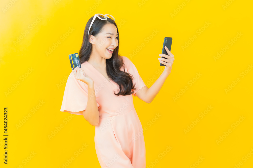 Portrait beautiful young asian woman smile with credit card Portrait beautiful young asian woman smile with credit card