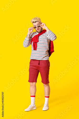 Handsome young man on color...