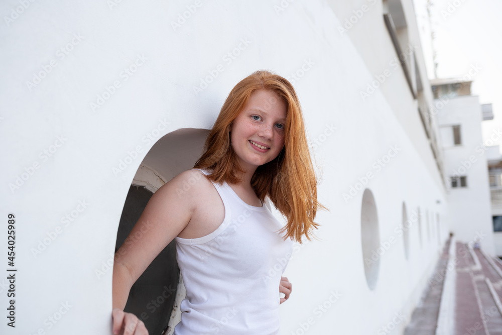 portrait of a teenage girl with red hair