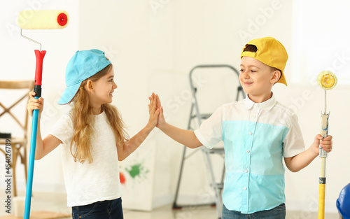 Little painters giving each...