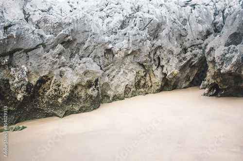 Rock and sea sand photo